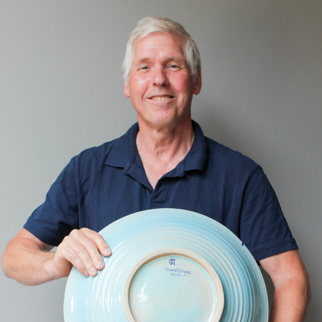 Picture of David Wright at the wheel in his pottery studio