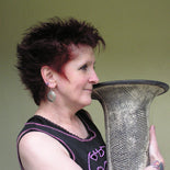 Potter Lesley McShea holding a large vase